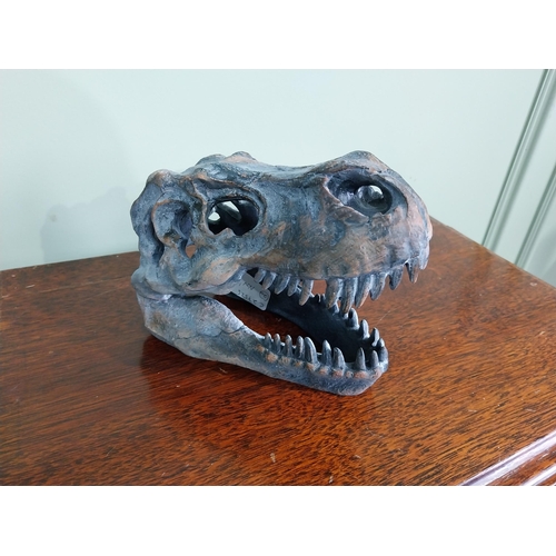 65 - Resin model of a Dinosaur skull. {15 cm H x 12 cm W x 20 cm D}.