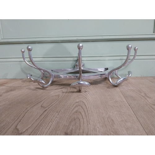 67 - Chrome wall mounted hat and coat rack. {20 cm H x 60 cm W x 30 cm D}