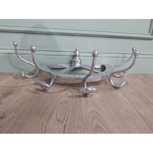 67 - Chrome wall mounted hat and coat rack. {20 cm H x 60 cm W x 30 cm D}