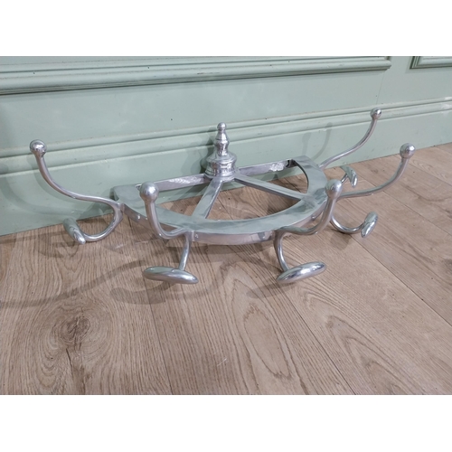 67 - Chrome wall mounted hat and coat rack. {20 cm H x 60 cm W x 30 cm D}