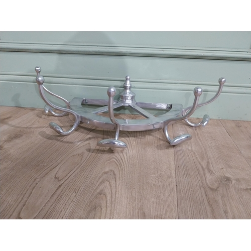 67 - Chrome wall mounted hat and coat rack. {20 cm H x 60 cm W x 30 cm D}