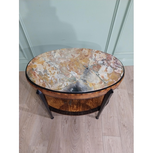 71 - Art Deco oval satinwood and ebony occasional table with marble top raised on tapered legs. {67 cm H ... 