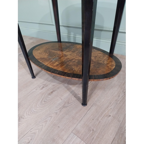 71 - Art Deco oval satinwood and ebony occasional table with marble top raised on tapered legs. {67 cm H ... 