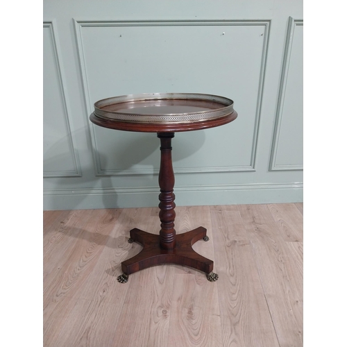 79 - Regency mahogany wine table with brass gallery raised on single turned column on platform base. {74 ... 