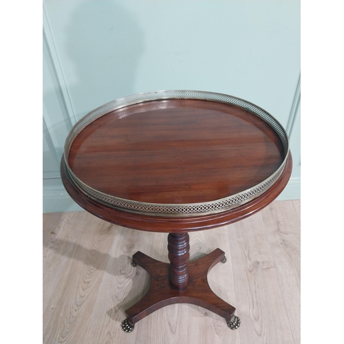 79 - Regency mahogany wine table with brass gallery raised on single turned column on platform base. {74 ... 