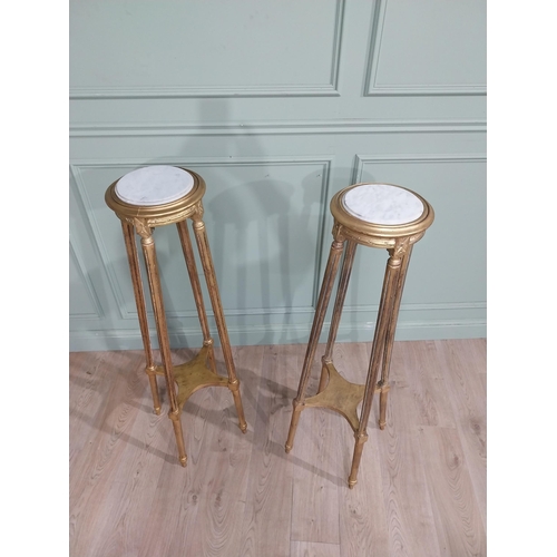 8 - Pair of French gilt wood torchieres with marble tops. {122 cm H x 23 cm Dia.}.