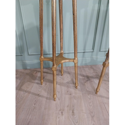 8 - Pair of French gilt wood torchieres with marble tops. {122 cm H x 23 cm Dia.}.