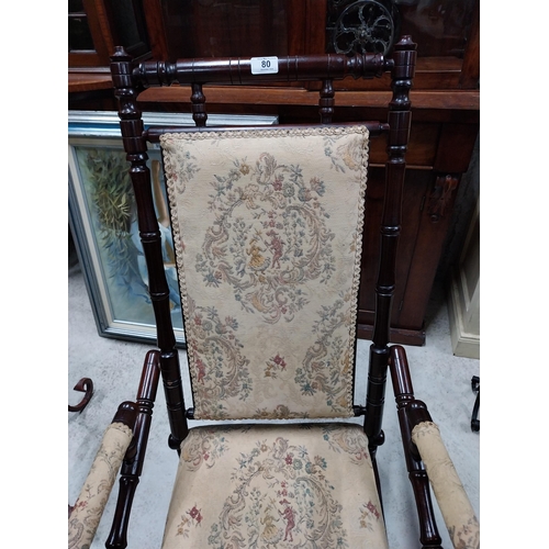 80 - Mahogany and upholstered Rocking chair in the Victorian style. {100 cm H x 54 cm W x 65 cm D}.