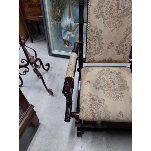 80 - Mahogany and upholstered Rocking chair in the Victorian style. {100 cm H x 54 cm W x 65 cm D}.