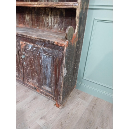 82 - 19th C. Galway Irish painted pine kitchen dresser with two long panelled doors over three plate rack... 