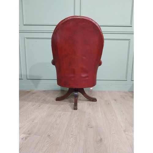 90 - Good quality hand dyed French oxblood leather deep buttoned swivel office chair raised on four splay... 