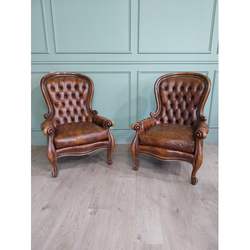 95 - Pair of good quality walnut and leather upholstered armchairs in the Victorian style. {106 cm H x 80... 