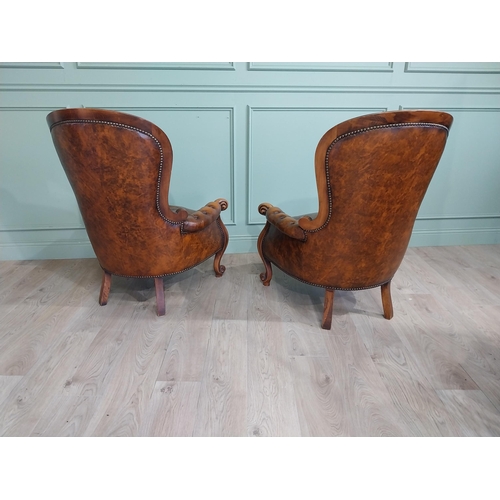 95 - Pair of good quality walnut and leather upholstered armchairs in the Victorian style. {106 cm H x 80... 