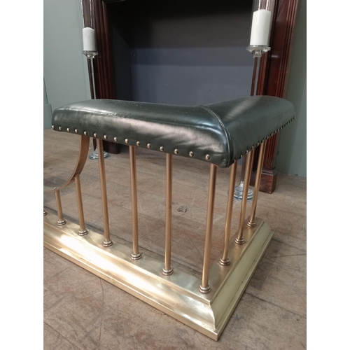 12 - Brass and green leather upholstered club fender with brass studs. {H 50cm x W 154cm x D 55cm Inside ... 