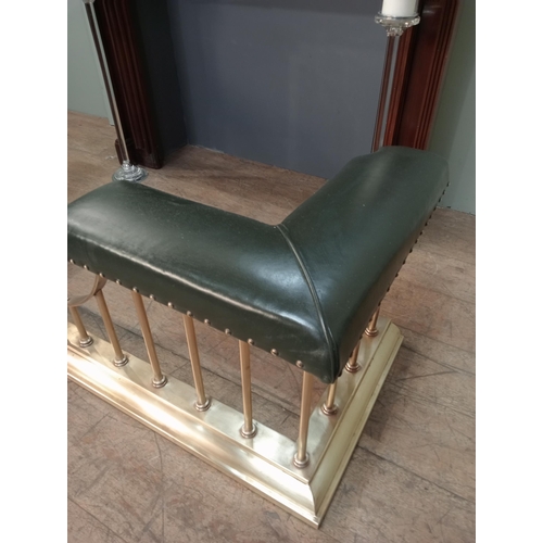 12 - Brass and green leather upholstered club fender with brass studs. {H 50cm x W 154cm x D 55cm Inside ... 