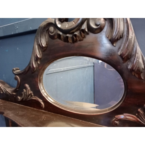 135 - Mahogany carved bevelled glass wall mirror {H 80cm x W 120cm x D 15cm }