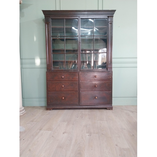 319 - Early 20th C. Original scumbled pine bookcase with two long glazed doors flanked by inset columns ov... 