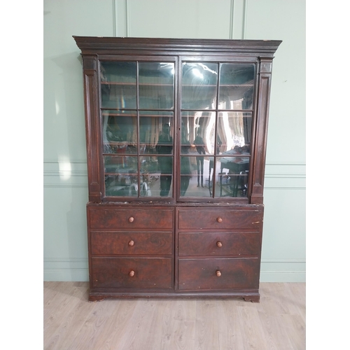 319 - Early 20th C. Original scumbled pine bookcase with two long glazed doors flanked by inset columns ov... 