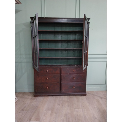 319 - Early 20th C. Original scumbled pine bookcase with two long glazed doors flanked by inset columns ov... 