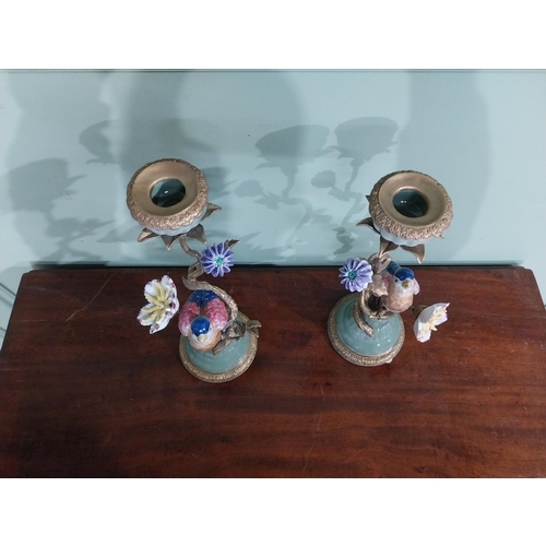 18 - Pair of  ceramic candlesticks decorated with birds and foliage and ormolu mounts. {30 cm H x 15 cm D... 