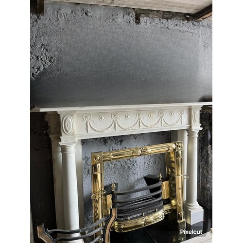 162 - Georgian carved Carrera marble fireplace with carved apron decorated with swags and ribbons and flan... 