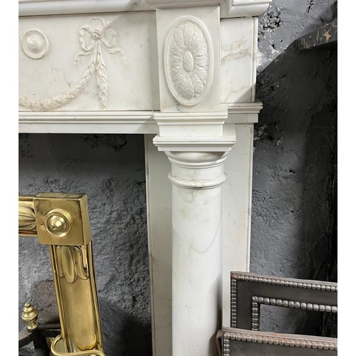 162 - Georgian carved Carrera marble fireplace with carved apron decorated with swags and ribbons and flan... 