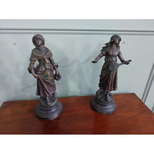 576 - Pair of 19th C. spelter figures {36 cm H x 13 cm Dia.}.