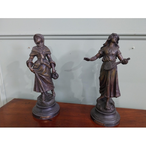 576 - Pair of 19th C. spelter figures {36 cm H x 13 cm Dia.}.