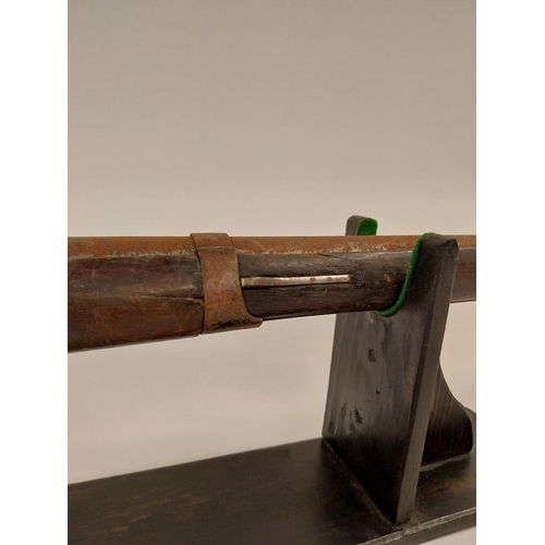 720 - 19th C. percussion capped long barrelled rifle. {146 cm L}.