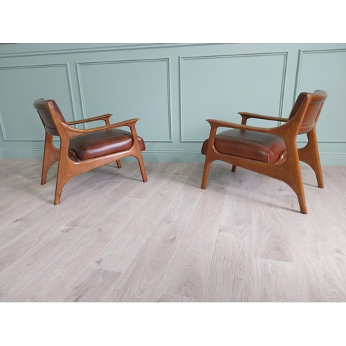 199 - Pair of cherrywood and hand dyed leather open arm chairs {74 cm H x 58 cm W x 82 cm D}.