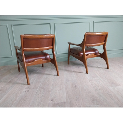 199 - Pair of cherrywood and hand dyed leather open arm chairs {74 cm H x 58 cm W x 82 cm D}.