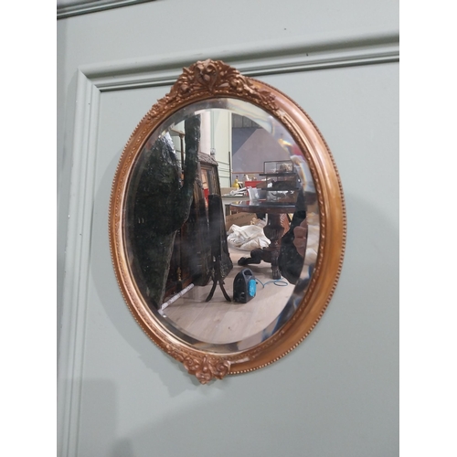 100 - Pair of 19th C. Bevelled oval mirrors. {35 cm H x 30 cm Dia.}