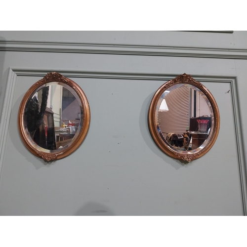 100 - Pair of 19th C. Bevelled oval mirrors. {35 cm H x 30 cm Dia.}