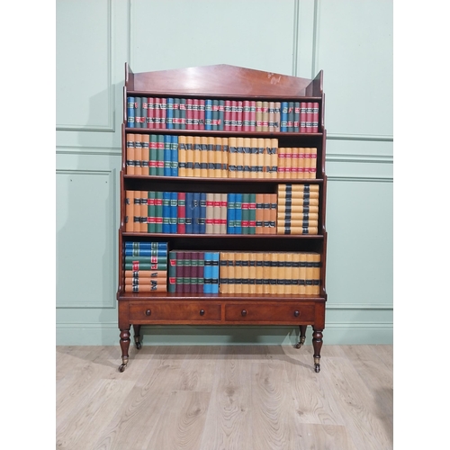 100A - Irish Georgian mahogany waterfall bookcase with two drawers in frieze. {170 cm h x 110 cm W x 35 cm ... 