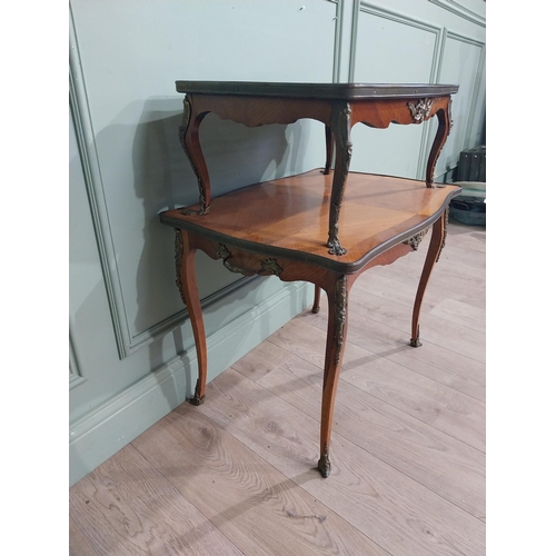 102 - Edwardian French kingwood etagere with ormolu mounts. {82 cm H x 74 cm W x 52 cm D}.