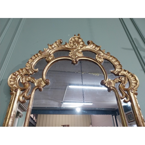 105 - Early 20th C. Italian giltwood wall mirror. {117 cm H x 76 cm W}.