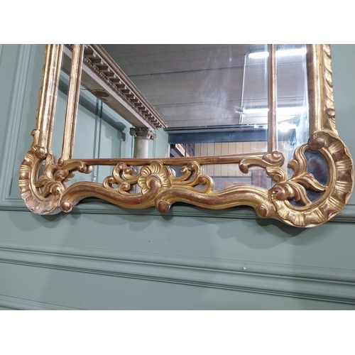 105 - Early 20th C. Italian giltwood wall mirror. {117 cm H x 76 cm W}.