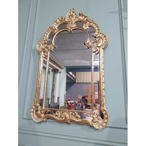 105 - Early 20th C. Italian giltwood wall mirror. {117 cm H x 76 cm W}.