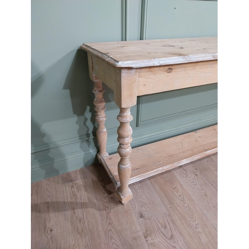 11 - 19th C. Irish pine serving table on turned legs and platform base. {83 cm H x 189 cm W x 48 cm D}.