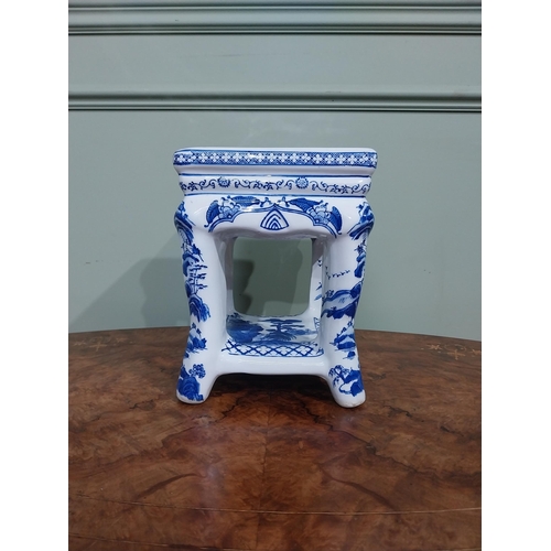 120 - Blue and white oriental ceramic jardiniere stand. {25 cm H x 22 cm W x 23 cm D}.