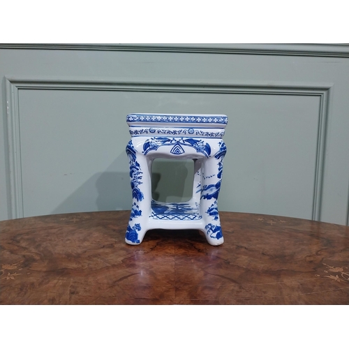 120 - Blue and white oriental ceramic jardiniere stand. {25 cm H x 22 cm W x 23 cm D}.