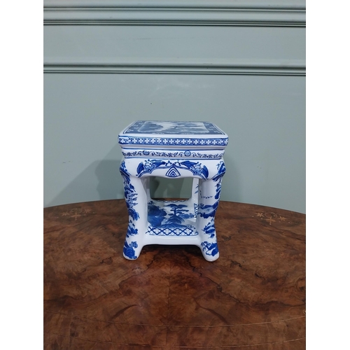 120 - Blue and white oriental ceramic jardiniere stand. {25 cm H x 22 cm W x 23 cm D}.