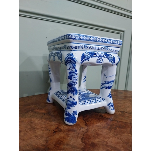 120 - Blue and white oriental ceramic jardiniere stand. {25 cm H x 22 cm W x 23 cm D}.