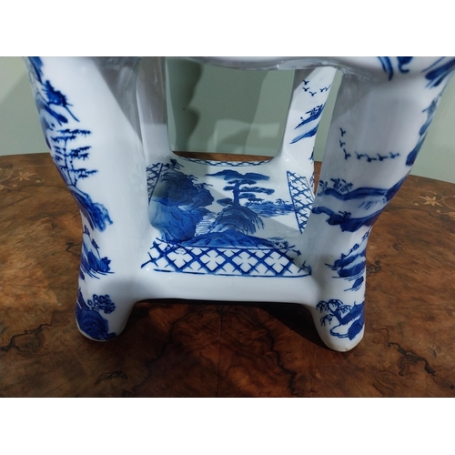 120 - Blue and white oriental ceramic jardiniere stand. {25 cm H x 22 cm W x 23 cm D}.