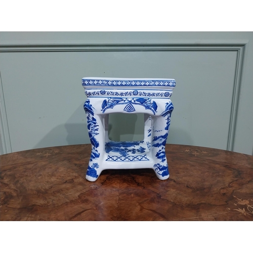 120 - Blue and white oriental ceramic jardiniere stand. {25 cm H x 22 cm W x 23 cm D}.