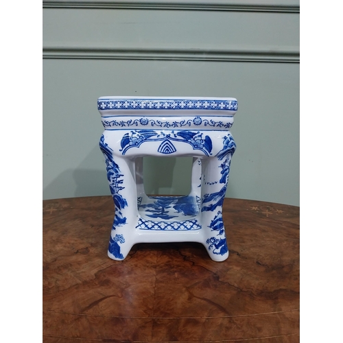 120 - Blue and white oriental ceramic jardiniere stand. {25 cm H x 22 cm W x 23 cm D}.