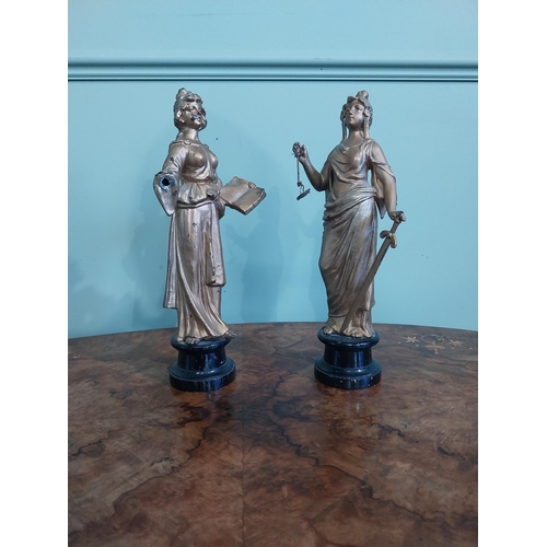 122 - Two early 20th C. gilded spelter figures of Justice. {32 cm H}