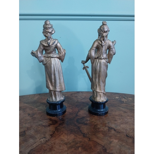 122 - Two early 20th C. gilded spelter figures of Justice. {32 cm H}