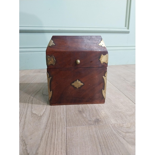 125 - Mahogany and brass bound box with fitted interior. {18 cm H x 15 cm W x 15 cm D}.