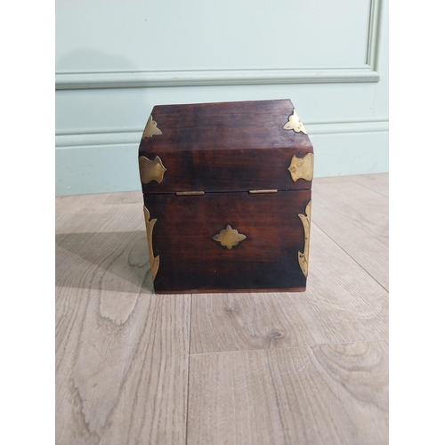 125 - Mahogany and brass bound box with fitted interior. {18 cm H x 15 cm W x 15 cm D}.